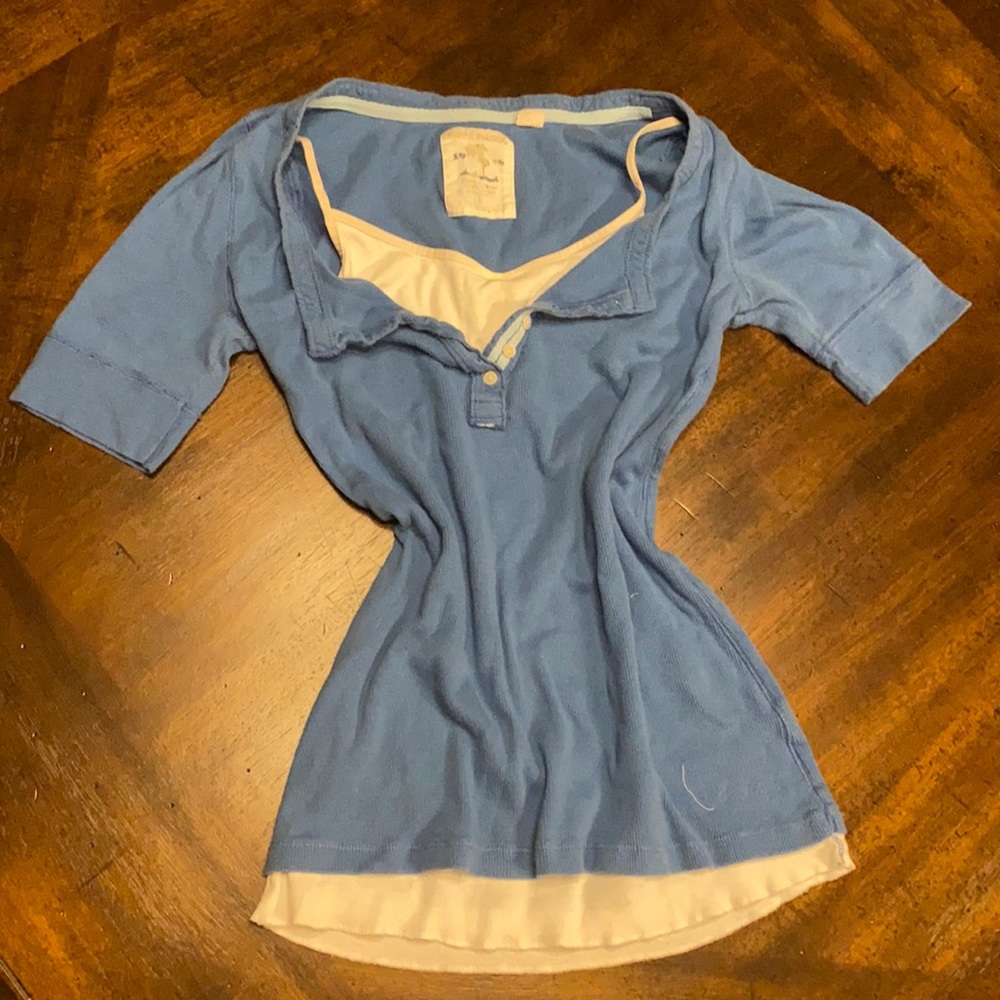 Blue t-shirt with white tank top built-in